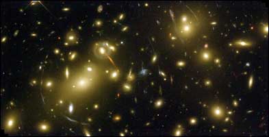 Small cluster of galaxies affected by time (kal) and the actions (karm) of the souls